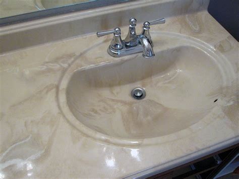 Refinish an old water damaged bathroom vanity. Refinishing the Bathroom Vanity Top: Part 1 - JulepStyle