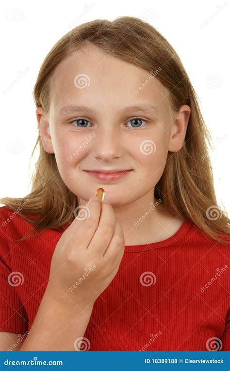 Young Girl Taking A Pill Stock Photo Image Of Background 18389188