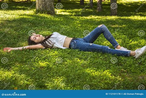 Relaxing Girl Lying On The Grass Stock Photo Image Of Fresh