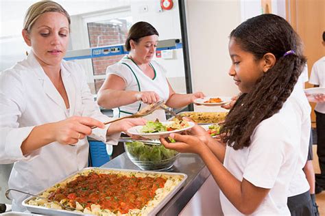 School Lunch Lady Stock Photos Pictures And Royalty Free Images Istock
