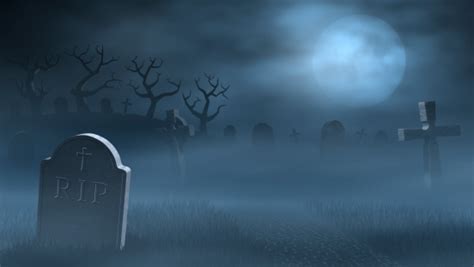 Tombstones On A Spooky Misty Graveyard Full Moon At Night Stock Photo