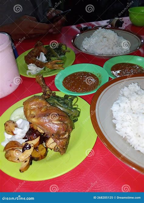 Pecel Ayam Or Ayam Penyet Is A Traditional Indonesian Fried Chicken