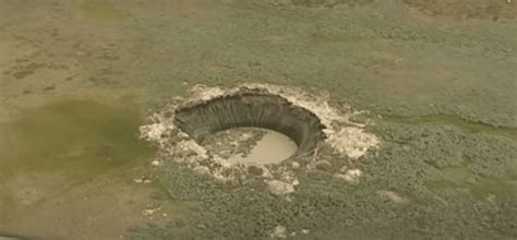 Massive Mystery Holes Appear In Siberian Tundra