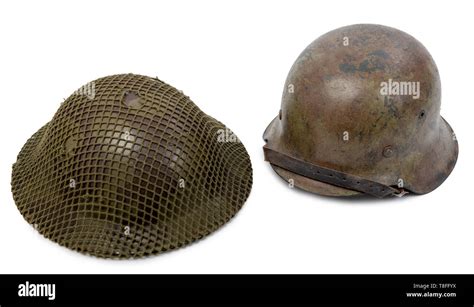 German And British World War Two Military Helmets A Battle Of Normandy