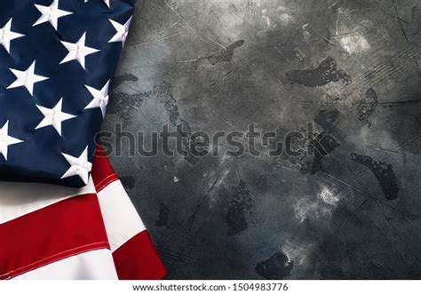 American Usa Flag On Concrete Background Stock Photo 1504983776