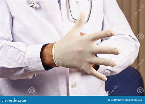 Doctor Putting Glove On Stock Photo Image 33010830