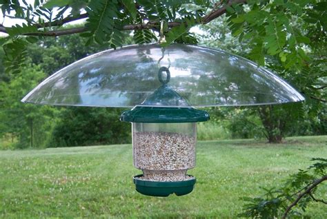Our quality bird feeder weather domes protect hanging bird feeders from sun, wind, rain and snow. Clingers Only Bird Feeder with 20" Hanging Squirrel Baffle