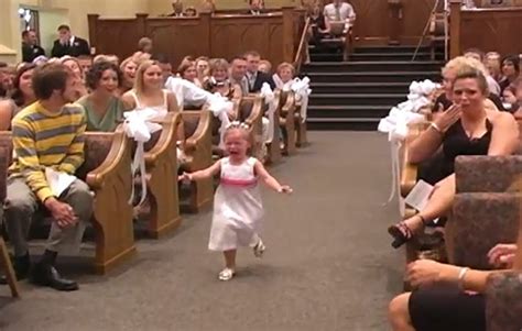 today s lol cute video screaming flower girl runs down the aisle at wedding steals the show