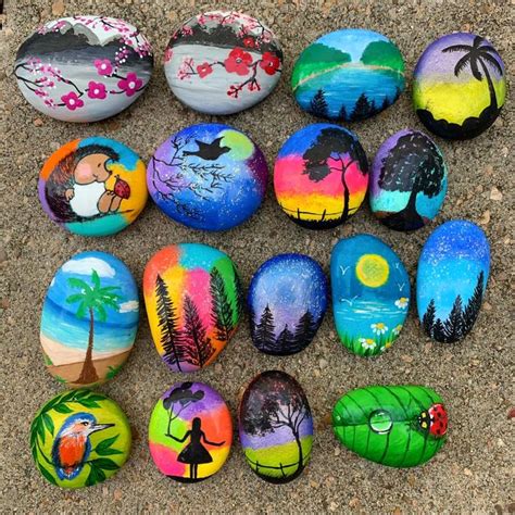 Many Painted Rocks Are Sitting On The Ground