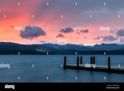 Lake Windermere Looking Towards The Langdale Pikes At Sunset Stock