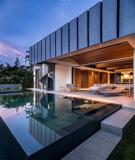 A continuous window that is shaped in a circle all around the house provides a 360 degree connection between the inside and outside of the house. A Miami Beach Villa Designed From the Inside Out in 2020 ...