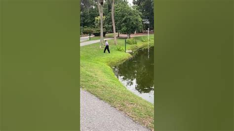 Alligator Chases Fisherman Away From Pond Youtube