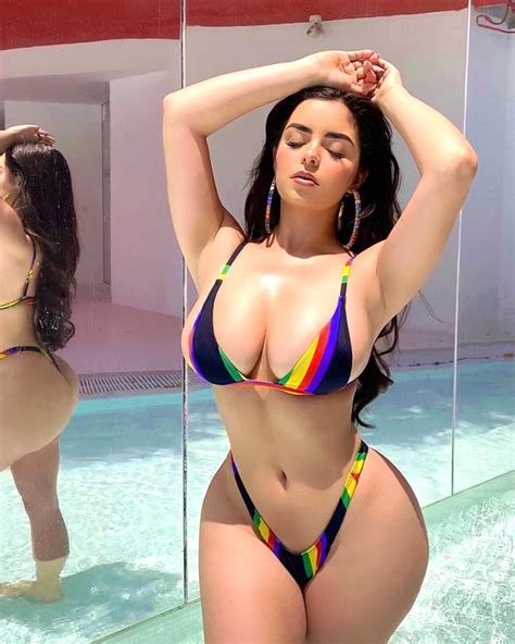 Demi Rose Puts On A VERY Busty Display In A Sheer Lace Bustier And