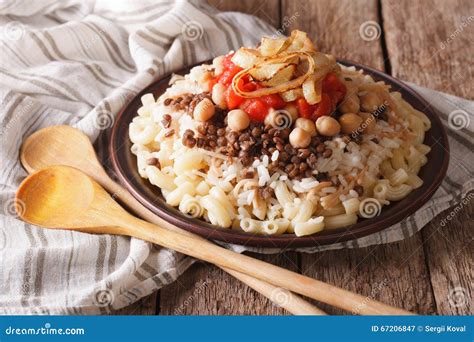 Arabic Cuisine Kushari Of Rice Pasta Chickpeas And Lentils Cl Stock