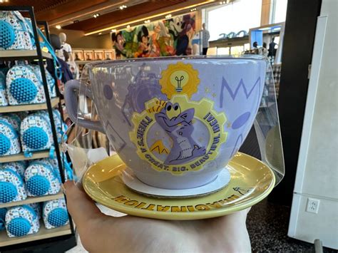 New Figment Merchandise Lands In EPCOT Including Imagination Themed Apparel And Mug With Saucer