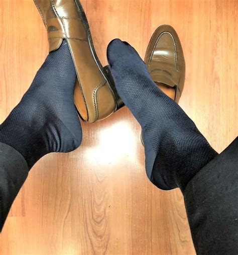 well dressed men and their socks photo