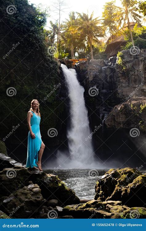Travel Lifestyle Young Traveler Woman At Waterfall In Tropical Forest