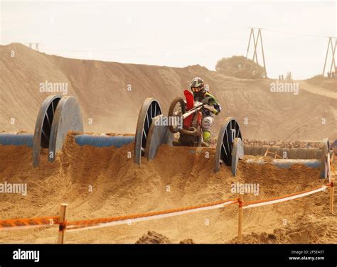 Motorbike Enduro Races The Competitor Overcomes The Obstacle Along The