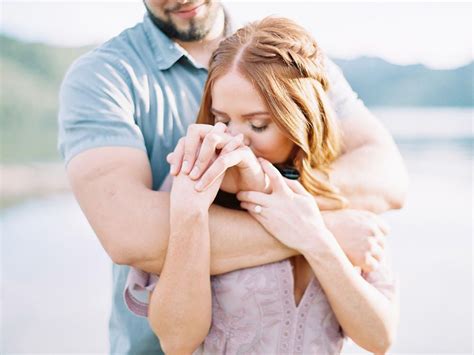 Hand Kissing Cuddly Poses Unique Romantic Poses Mauve Lace Dress Pastel Engagement Out