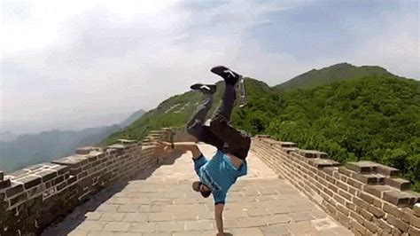 Awesome guy does awesome hand stands in awesome places on ...