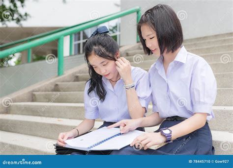 Asian Thai High Schoolgirls Student Couple In School Reading And