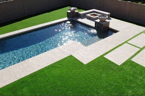 Pool Surrounded By Artificial Grass Artificial Turf Pool Landscaping