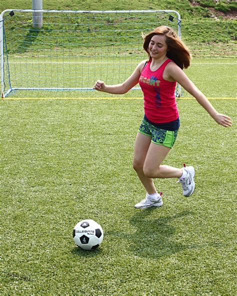 Soccer Free Stock Photo A Cute Young Girl Kicking A Soccer Ball