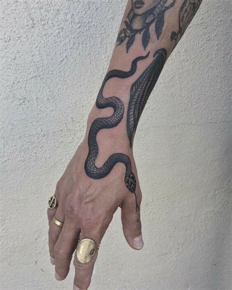 14 Viperid Snake Tattoo Designs And Ideas Petpress Snake Tattoo