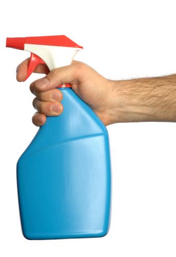Male Hand Holding Spray Bottle Isolated On White Background Stock Photo