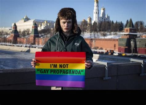 Russian Blogger Zhenya Svetski Stands With A Sign Reading Im Not Gay Propaganda In Moscow