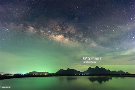 Beautiful Night Starry Sky With Rising Milky Way Over The Mountain