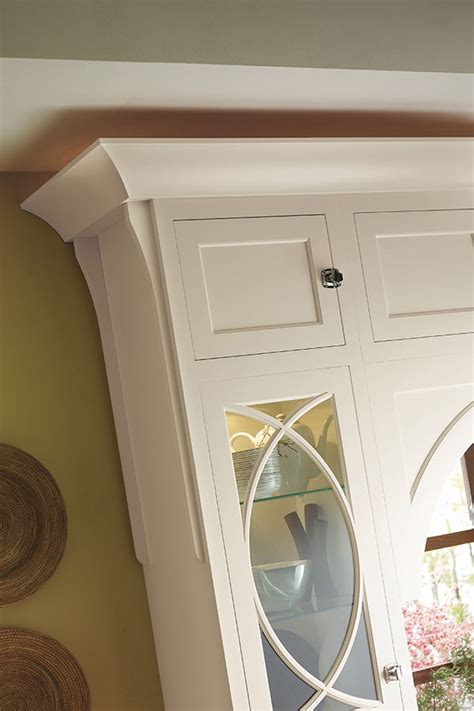The benefit of installing crown molding is that it draws the eye upward, showcasing the elegance of your cabinets. Architectural Cove Moulding - Omega Cabinetry