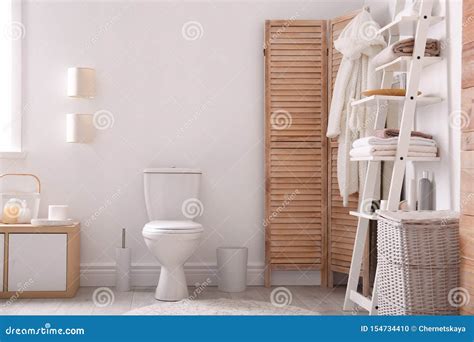 Ceramic Toilet Bowl In Stylish Bathroom Idea For Interior Stock Photo