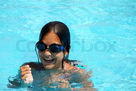 Happy Teen Girl With Goggles Blue Swimming Pool Portrait Stock Photo