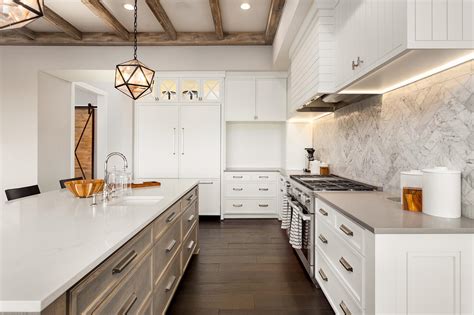White kitchen cabinets with dark granite countertop. Affordable Natural Quartz Countertops in Mesa, AZ, 85210
