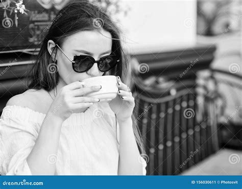Woman In Sunglasses Drink Coffee Outdoors Girl Relax In Cafe Cappuccino Cup Caffeine Dose