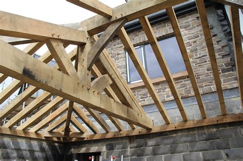 Hip rafters are the diagonal rafters that span from the ridge at the top down to the corners of the roof. Swansea oak framed hipped roof by Castle Ring Oak Frame ...