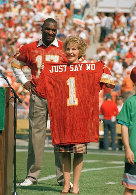 Nancy Reagan First Lady Of The United States Holds Up A Jersey Emblazoned With Her Famous Anti