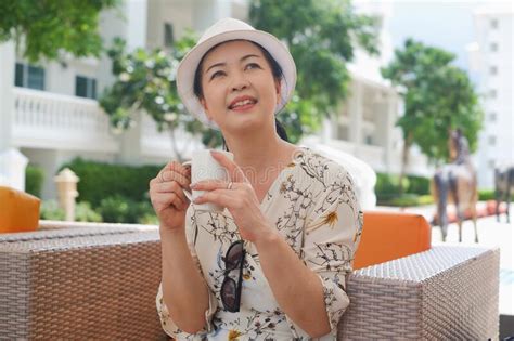 Portrait Senior Asia Woman Wear A Hat Sit In Lobby Stock Photo Image