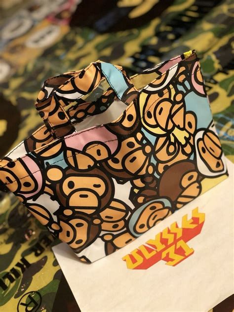 The a bathing ape collection of bags features backpacks and holdalls designed in the brand's signature camouflage print. Baby Milo Tote 100% Authentic A Bathing Ape #BAPEToteBag # ...