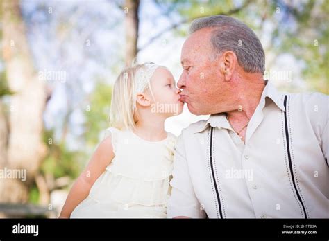 Loving Grandfather And Grandbabe Kissing Outside At The Park Stock Photo Alamy