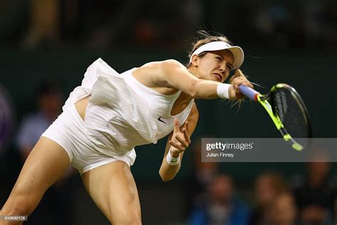 Eugenie Bouchard Of Canada Serves During The Ladies Singles First