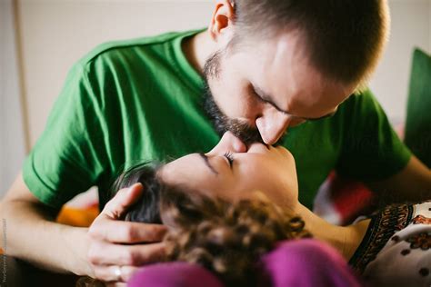 Portrait Of Kissing Couple By Stocksy Contributor Yury Goryanoy Stocksy