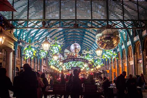 Covent Garden Lit Up At Night For Christmas In Winter London England