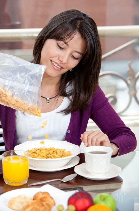 Beautiful Woman Eating Her Breakfast At Home Freestock Photos