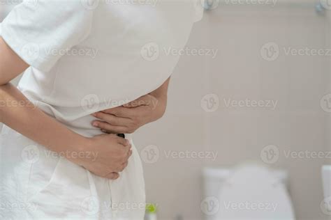 Constipation And Diarrhea In Bathroom Hurt Woman Touch Belly Stomach