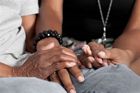 Black People Holding Hands Stock Photos Pictures And Royalty Free Images