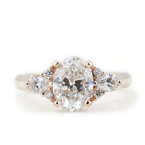 Average customer rating $ 4.9 out of 5 stars. Oval Diamond Side Stone Cluster Ring Engagement Ring ...