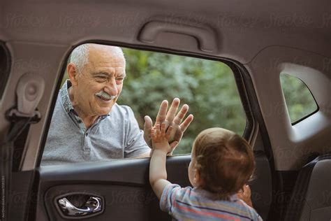 Grandpa Greets Grandson By Stocksy Contributor Ani Dimi Stocksy