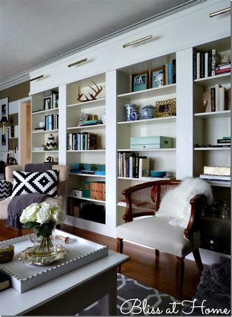 The outer two bookcases were screwed to the side walls to ensure they do not move, while the center pieces were then screwed to the side pieces. Den Project: Built In Billy Bookcase Ideas - Southern ...